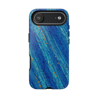 Inspiring Phone Cases cobalt blue MagSafe iPhone case with abstract diagonal brushstrokes and vibrant orange accents.