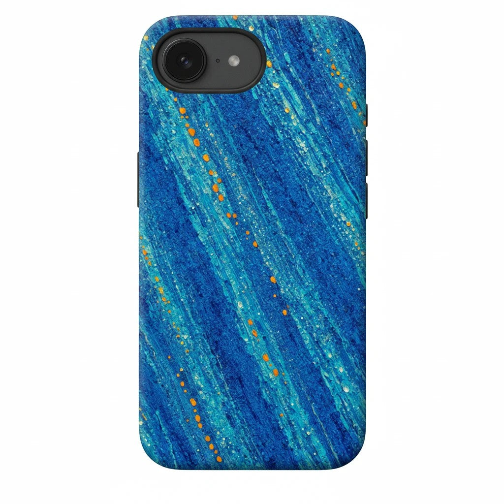 Inspiring Phone Cases cobalt blue iPhone case with abstract diagonal drift pattern and vibrant orange accent flecks.