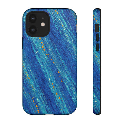 Inspiring Phone Cases MagSafe iPhone case featuring cobalt blue abstract drift pattern with vibrant orange accents.