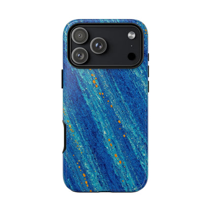 Inspiring Phone Cases MagSafe iPhone case with abstract cobalt blue drift pattern and vibrant orange accents