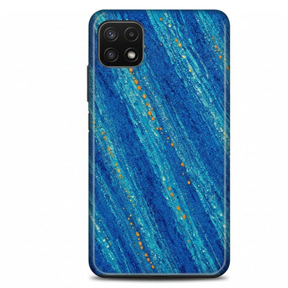 Inspiring Phone Cases Cobalt Drift phone case with abstract blue diagonal strokes and vibrant orange accents