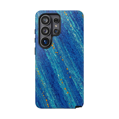 Inspiring Phone Cases Cobalt Drift Samsung phone case with abstract blue diagonal strokes and vibrant orange flecks.