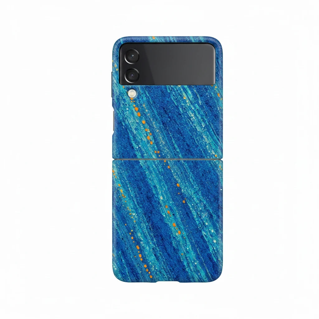 Inspiring Phone Cases Cobalt Drift Samsung Galaxy Z Flip case with blue abstract strokes and vibrant orange accents